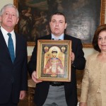 HRH Crown Prince Alexander II, Mr Igor Smikov, advisor to the Primate of the Russian Orthodox Church Abroad Metropolitan Hilarion of Eastern America and New York and the head of the Military Orthodox Mission who holds Miraculous Icon of St. Tsar Nicholas and HRH Crown Princess Katherine