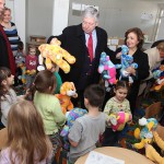 Crown Prince Alexander and Crown Princess Katherine, accompanied by Mr Goran Mutabdžija, Minister of Education and Culture of the Republic of Srpska, giving presents to the children of the preschool "Joy" in Samac