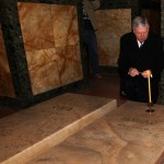 Crown Prince Aleksandar lights a candle at the tomb of HRH Prince Paul 