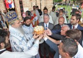 HRH Crown Prince Alexander and His Grace Bishop Teodosije of Ras and Prizren cut the Slava cake with guests