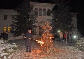 HRH Crown Prince Alexander while burning the yule log in front of the Royal palace