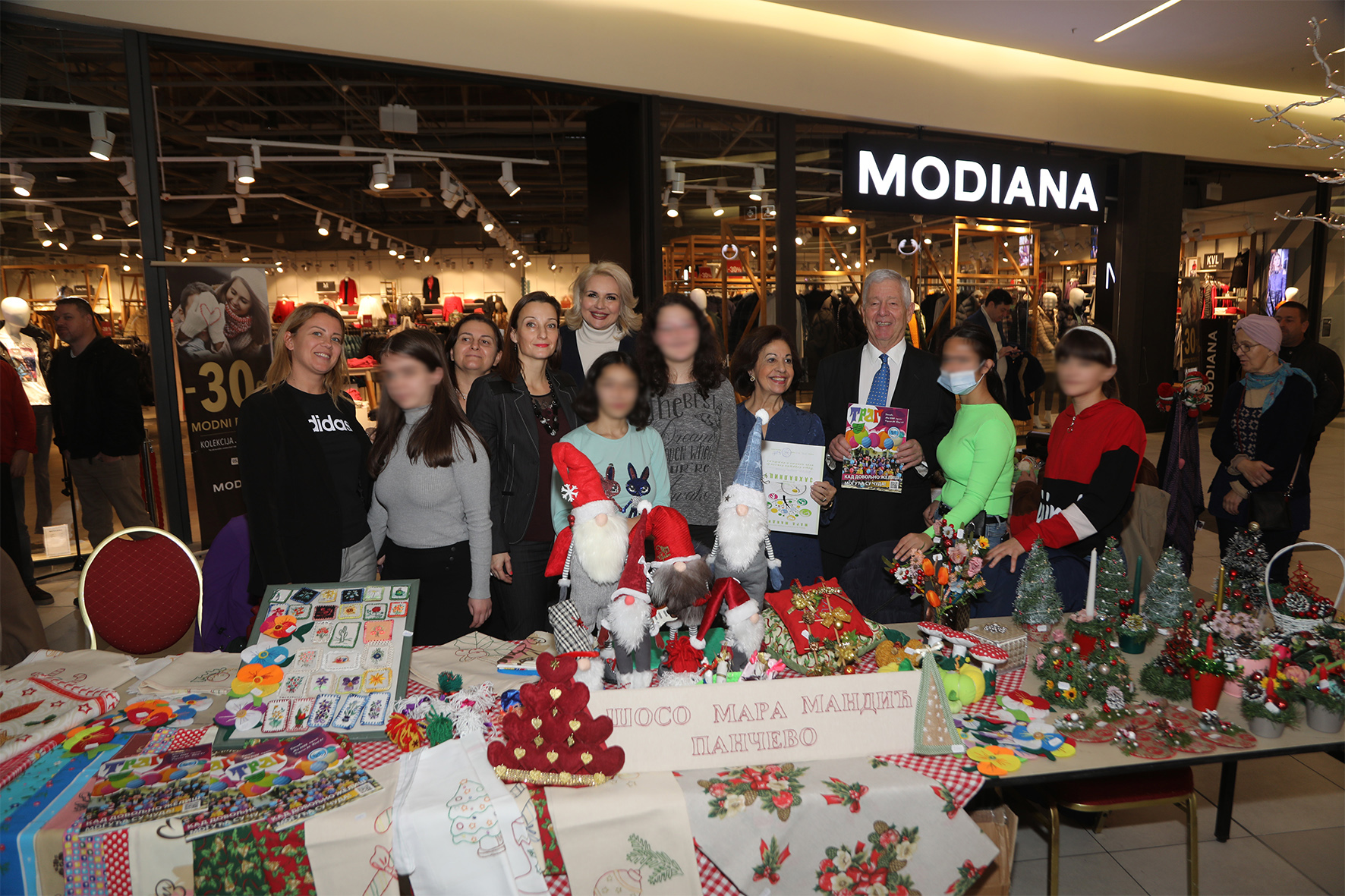 TRH Crown Prince Alexander and Crown Princess Katherine with HE Minister Darija Kisić and children participating at charity Christmas Bazaar